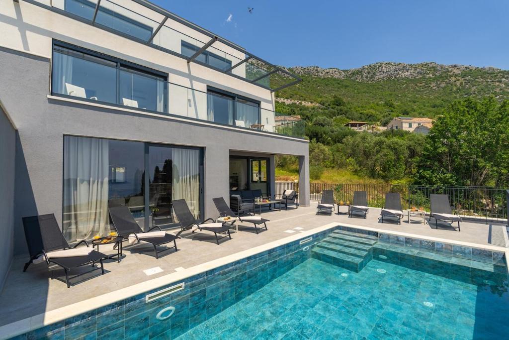 Villa exterior with pool